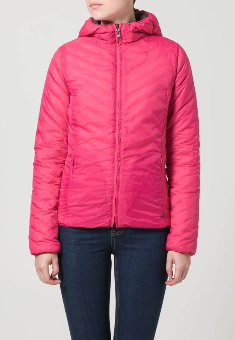 Pink, zippered puffer jacket with a hood, features chevron quilting and a lightweight design. Paired with dark blue jeans.