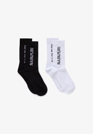 Deux paires de chaussettes montantes, une noire et une blanche, chacune avec le logo "NAPAPIJRI" imprimé verticalement sur les côtés.
