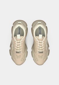 Beige athletic shoes with mesh and synthetic leather upper, round toe, laces, and rubber sole featuring textured accents.