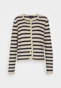 Raidallinen beige ja laivastonsininen neuletakki, jossa pyöreä pääntie, pitkät hihat ja kultaiset napit kiinnitystä varten. Raitakuvioitu ribbiknitti.