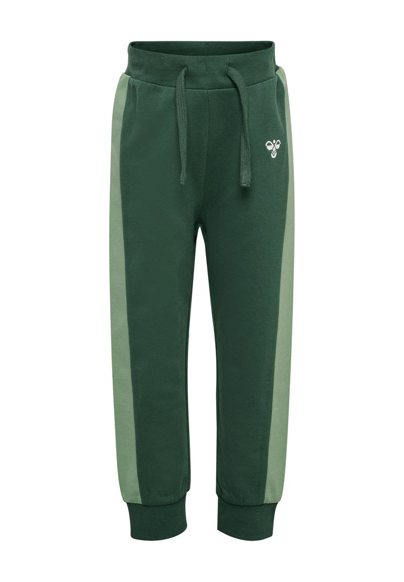 Gröna mjukisbyxor med en mörkare grön kropp, ljusare gröna sidopaneler, dragsko i midjan och en liten logotyp fram. Mjuk textur.