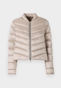 Light beige puffer jacket with a cropped design, featuring horizontal quilted lines, high collar, and a front zip closure.