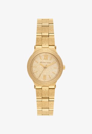 Orologio da polso color oro con cinturino strutturato, cassa rotonda, quadrante scintillante, indicatori in numeri romani e lancette semplici per le ore e i minuti.