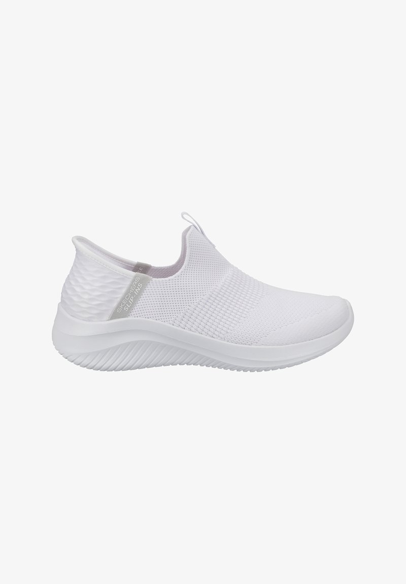 White slip-on sneaker with textured knit upper and rubber sole. Features a smooth toe cap and a pull tab at the heel for easy wearing.