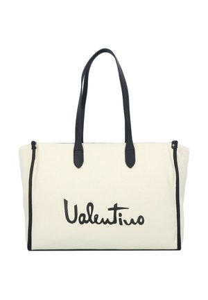 Sac fourre-tout en toile de couleur écrue avec des accents en cuir noir. Dispose de longues poignées et d'un imprimé logo noir proéminent. Fermeture zippée sur le dessus.