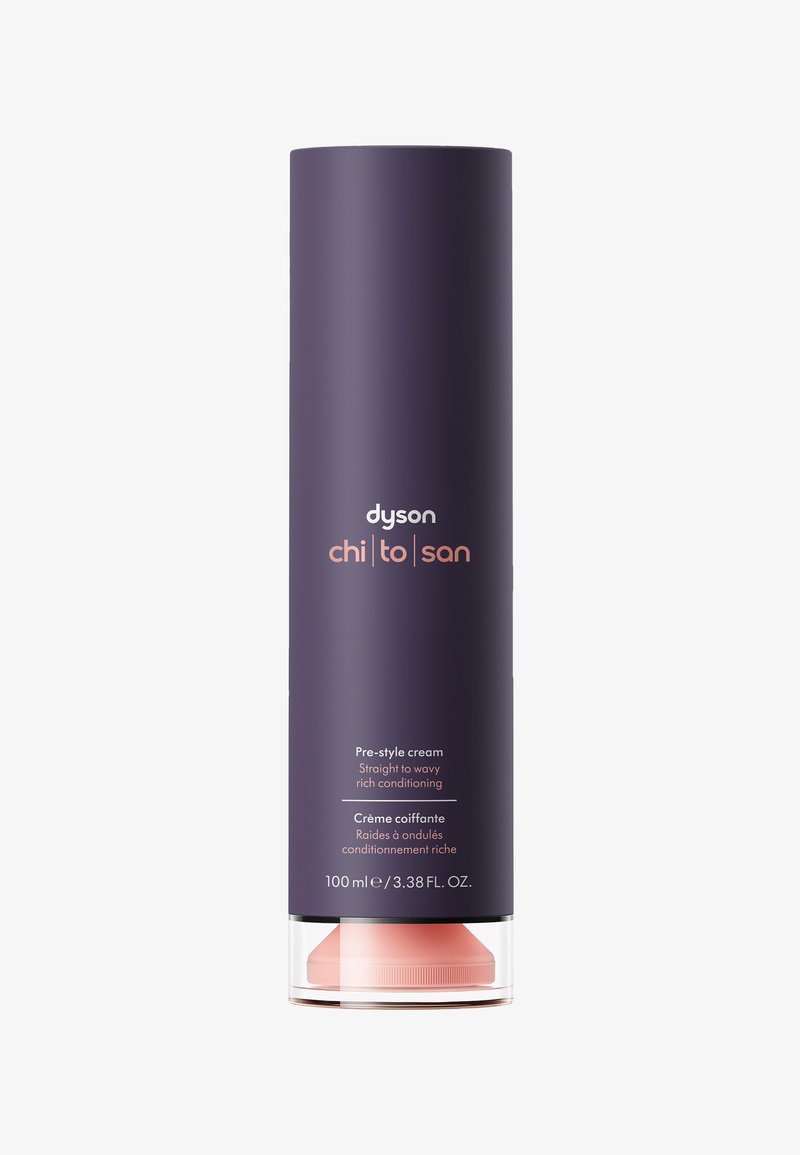 Dyson Chi To San pre-style cream bottle in dark purple, labeled for straight to wavy hair, 100 ml, pink dispenser cap visible.