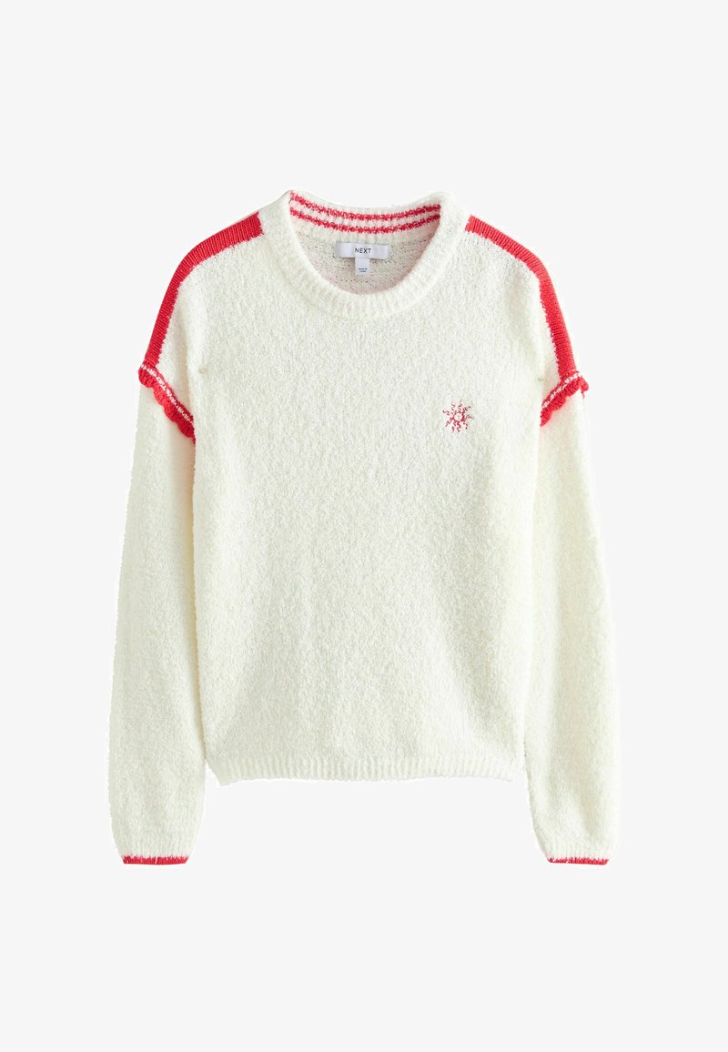 Fehér bolyhos pulóver hosszú ujjakkal, piros csíkok a vállakon és a mandzsettákon, valamint egy kis piros hópihe embléma a mellkason.