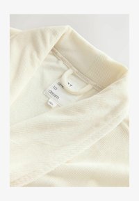 Sélectionné, cream
