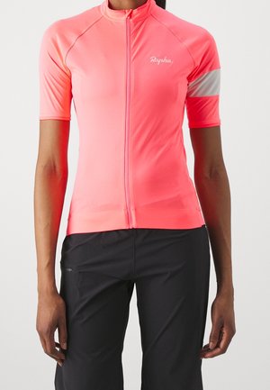 Padded cycling jersey in bright pink, featuring short sleeves, a front zipper, reflective stripe on the sleeve, and smooth, stretchy fabric.