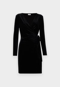 Vestido envolvente de veludo preto com mangas longas, decote em V e detalhe de laço lateral. Textura suave e design ajustado.