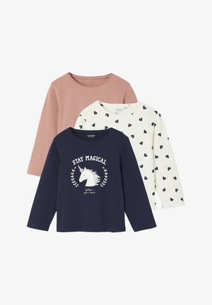 Three long-sleeve shirts: one pink, one white with navy hearts, one navy with a unicorn graphic and text. Cotton fabric, crew neck design.