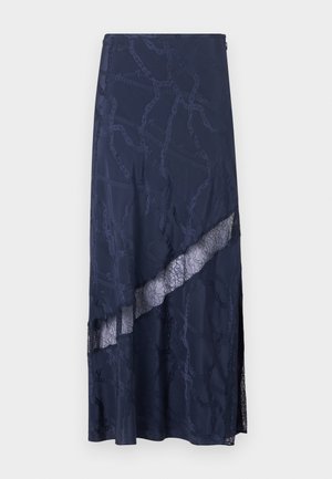 Navy maxi rok met een kantpaneel en kettingpatroon. Soepele textuur met een zijsplit voor extra detail.