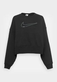 Black cropped sweatshirt made of soft fabric, featuring a large, dotted Nike logo in light blue across the chest. Long sleeves with a relaxed fit.
