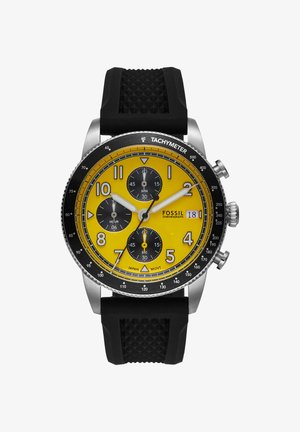 Orologio cronografo Fossil con quadrante giallo, contatori neri, lunetta tachimetrica, datario, cassa argento e cinturino in gomma nero testurizzato.