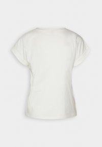 T-shirt blanc en coton à manches courtes, col rond et coupe décontractée. Texture lisse et design minimaliste.