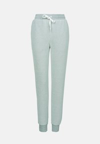 Lichtgroene sweatpants van textuurstof, met een trekkoord in de taille en aansluitende boorden bij de enkels.