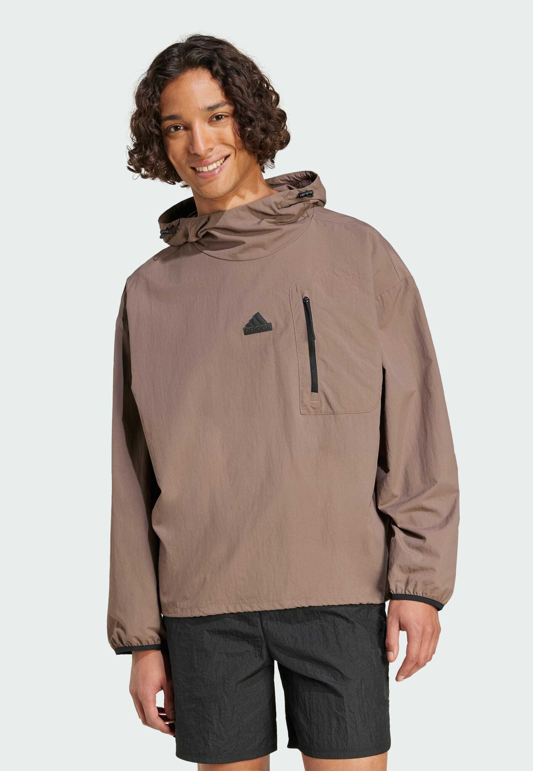 adidas Sportswear CITY ESCAPE WOVEN - Hoodie - earth strata/brown