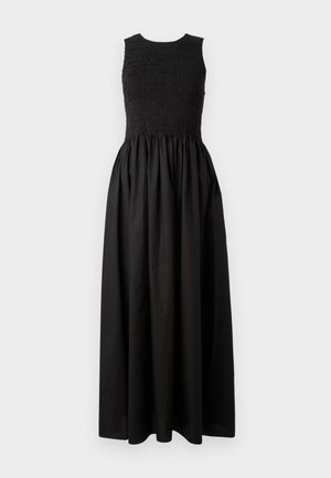 Robe sans manches noire avec corsage froncé, jupe fluide et longueur complète. Fabriquée en tissu léger avec une surface texturée.