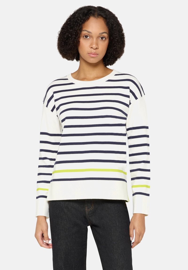 Bluzka z długim rękawem w biały kolorze z paskami w kolorze granatowym i limonkowym. Okrągły dekolt, luźny krój, miękki materiał i prążkowane mankiety.