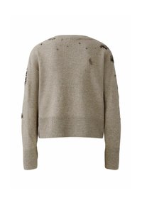 Beige gebreide trui met een cropped design, ribgebreide zoom en boorden, met decoratieve borduursels in donkere draden op de rug.
