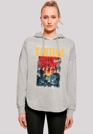 Grauer Kapuzenpullover mit lockerer Passform, gestaltet mit einem bunten Grafikdruck einer Band mit alienartigen Figuren und dem Text: "Die sensationelle Cantina-Band! Live in Mos Eisley!"