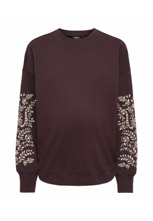 Sweat-shirt marron foncé à col ras du cou avec des poignets côtelés et des motifs de lianes florales en rose clair sur les deux manches.