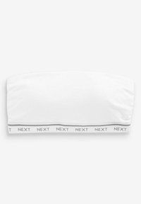 Weißes trägerloses Bandeau mit elastischem Bund unten, das den sich wiederholenden "NEXT" Text in Hellgrau zeigt.
