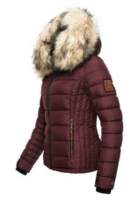 Burgundy puffer jacket featuring a faux fur hood, ribbed cuffs, and zipper accents. Contains a logo patch on the left sleeve.