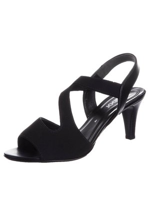 Sandale à talon haut noire à bout ouvert avec des brides croisées et un design à bride arrière, dotée d'un talon effilé fin et d'une finition lisse.