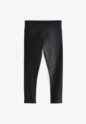 Sorte leggings med et glat, strækbart stof. Har en bred talje og et tætsiddende design, der smalner ind til anklen. Ingen synlige mønstre eller accenter.