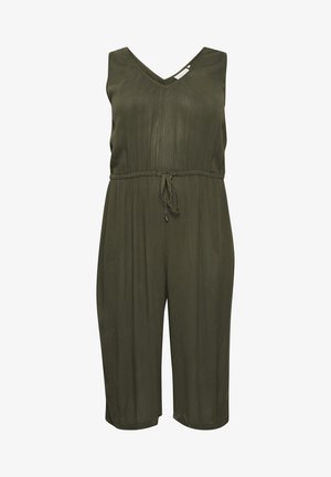 Olivno zelena brezrokavna kombinezonska obleka z V-izrezom, pasom z vrvico in širokimi, skrajšanimi hlačami. Gladek, lahkoten material z diskretno sijočo površino.