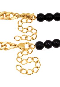 Gouden ketting met in elkaar vergrendelde schakels en zwarte kralen. Voorzien van een lobsterclasp en een lange ketting. Gepolijste afwerking met glanzende textuur.