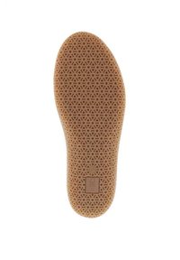 Rubber shoe insole in tan color featuring a textured pattern of small circles and a logo imprint near the bottom.