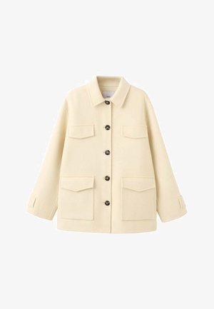 Cream-colored wool jacket with a collar, six front buttons, and two chest pockets. Features long sleeves and a relaxed fit.