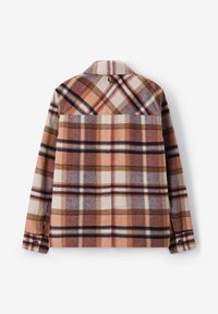 Geruite blouse met kraag, uitgevoerd in warme tinten oranje, bruin en crème. Gemaakt van zachte, gestructureerde stof met manchetten met knopen en detail aan de achterkant.