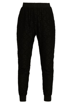 Čierne čipkové nohavice s elastickým pásom a rebrovanými manžetami, s textúrovaným vzorom po celej ploche a so zúženým strihom na nohách.