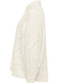 Lightweight, cream-colored shirt with a subtle leaf pattern, short sleeves, and a relaxed fit. Features a collared neckline and single chest pocket.