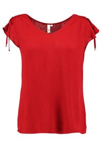 Rød T-shirt med korte ærmer, V-udskæring og snøre-detalje på ærmerne, lavet af letvægtigt struktureret stof. Glat finish og afslappet pasform.