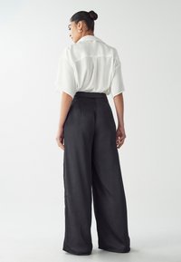 WILLA NAT - Püksid - black