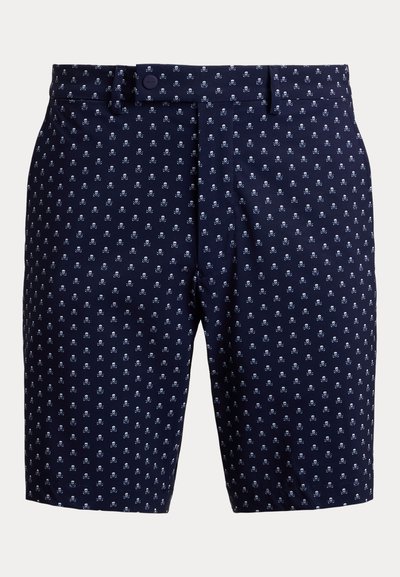 Tmavě modré šortky s celoplošným vzorem malých bílých lebek a zkřížených kostí, poutky na pásek a zapínáním na knoflík v pase.