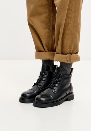 Botas para la nieve - black