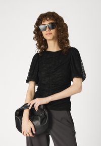 JDY JDYTANJA WIDE FLOWY PANT - Pantalon classique - phantom