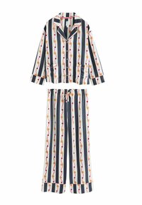 Baumwoll-Schlafanzugset mit einem langärmeligen Hemd mit Knopfleiste und einer Hose. Gemustert mit vertikalen Streifen und Sonnenmotiven in Gelb und Rot.