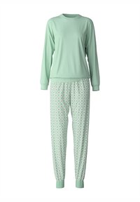 Mintgrünes Langarmoberteil mit Rundhalsausschnitt, kombiniert mit gemusterten Hosen mit Blumendesign und elastischen Bündchen an den Knöcheln.