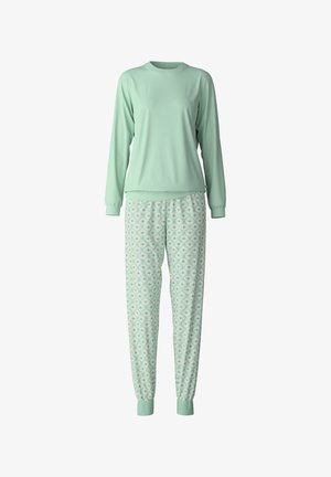 Maglione verde menta a maniche lunghe con scollatura rotonda, abbinato a pantaloni a fantasia con motivo floreale e polsini elastici alle caviglie.