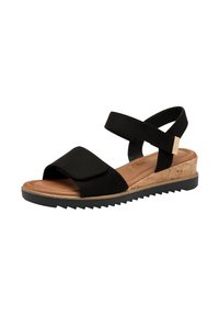 Sandali neri in suede con una larga fascia frontale, tacco curvo, suola in sughero a cuneo e suola in gomma con motivo a zigzag per garantire aderenza.