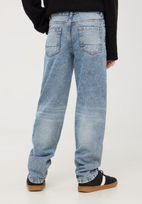 Terranova CON STAMPA GRAFFITI E STRAPPI - Jeans a sigaretta - var blu denim medio