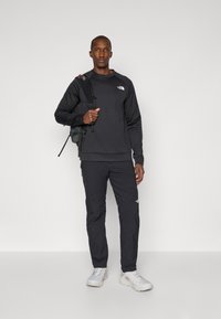 The North Face WINTER EXPLORATION TAPERED CARGO  - Hlače za na prostem - black