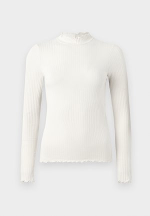 Maglietta a maniche lunghe bianca a costine con collo a ruffle e orlo sfilacciato. Texture liscia, design aderente.