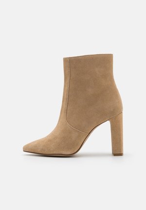 Enkellaarsjes met hoge hak - beige